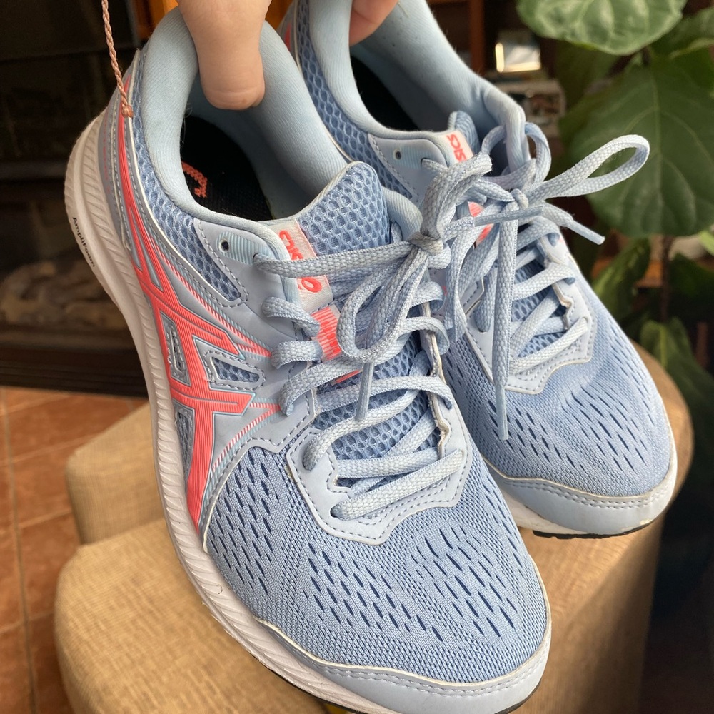 Light blue ASICS women’s running shoes